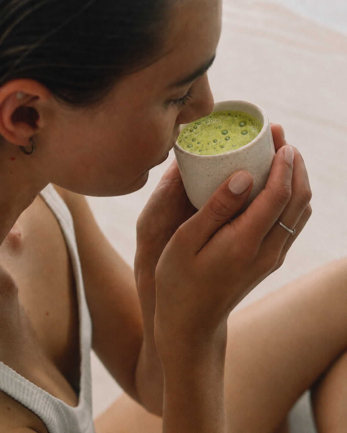 Preparing a matcha latte